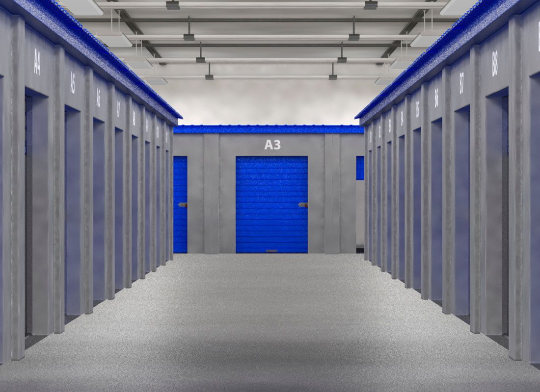 Self Storage Facility Insurance - Self Storage Doors and Hallway With Rows of Storage Units